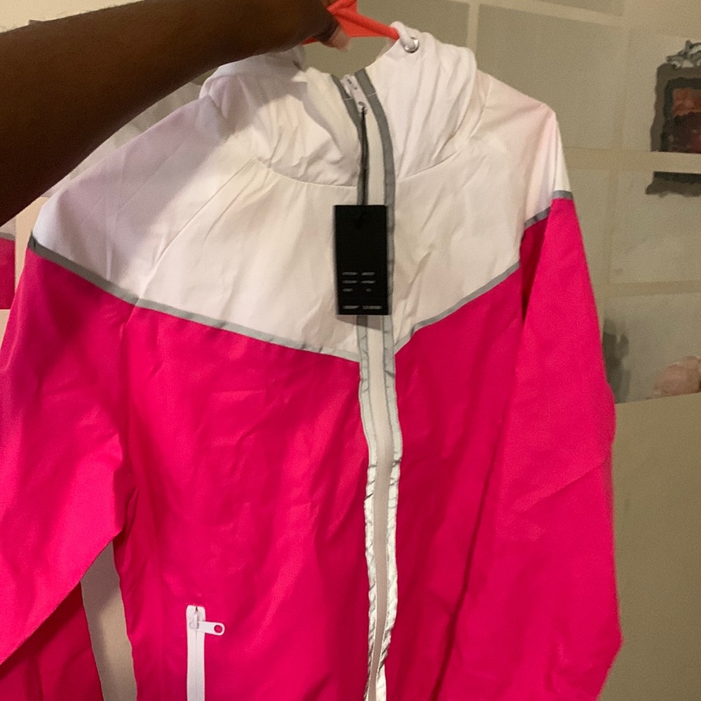THIS ITEM IS A CUTE LIGHT WIGHT PINK JACKET